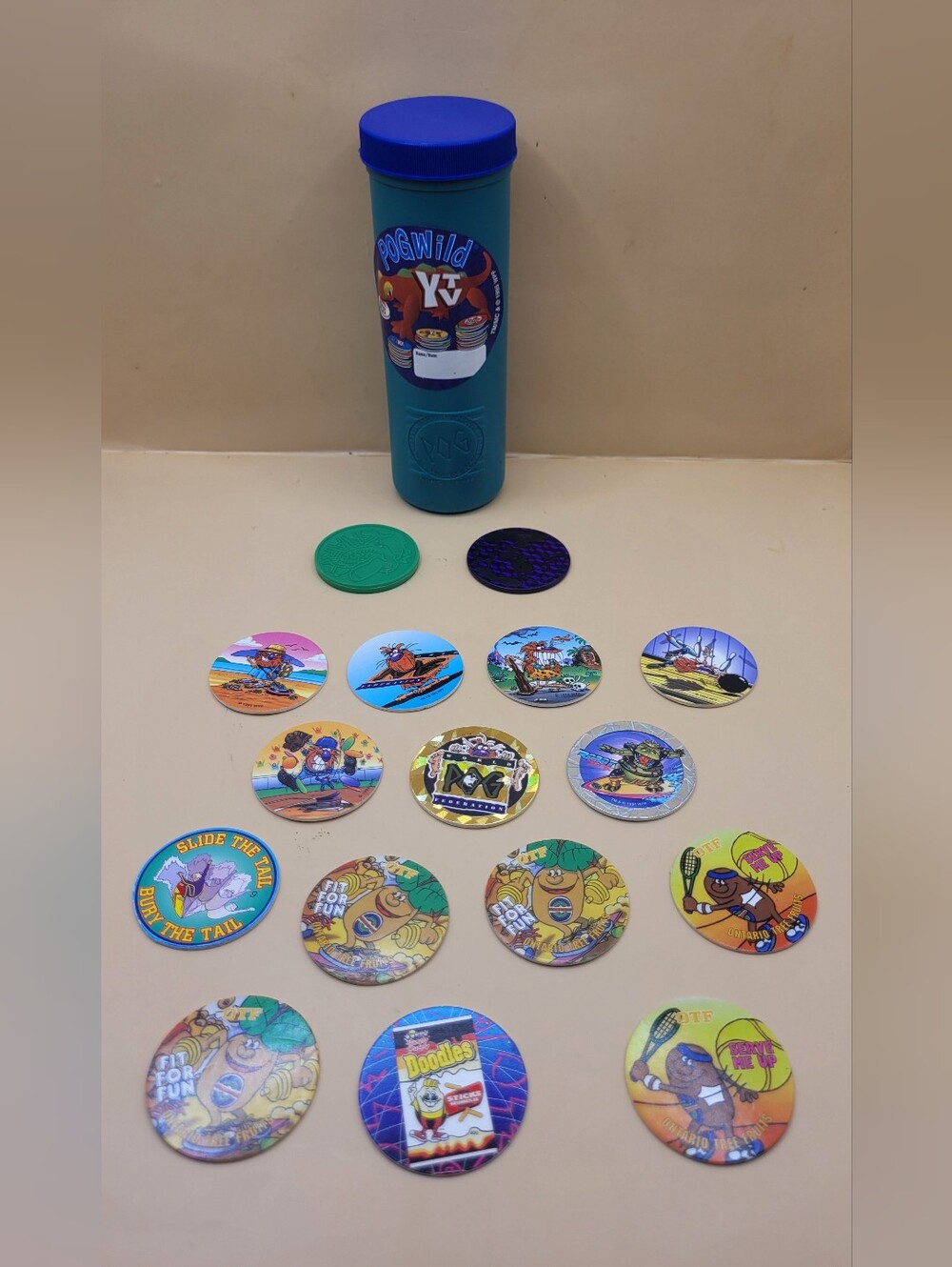 Vintage 1995 POG Wild YTV Tube Container With 15 Milk Caps & 2 Slammers Lot WPF